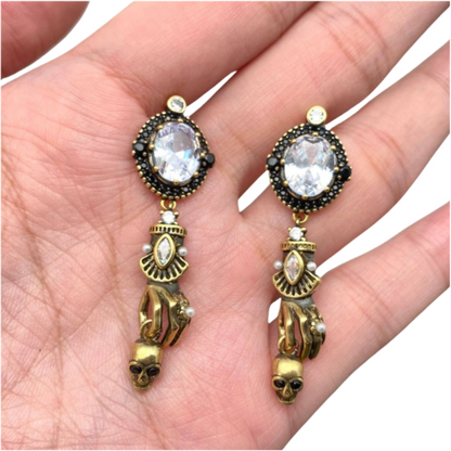 Skull In Hand Earrings